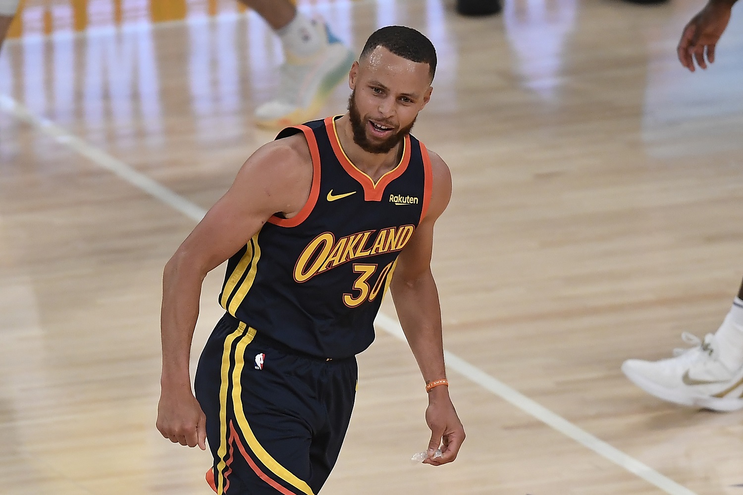 Stephen Curry of the Golden State Warriors reacts after hitting a 3-pointer against the Los Angeles Lakers on May 19, 2021.