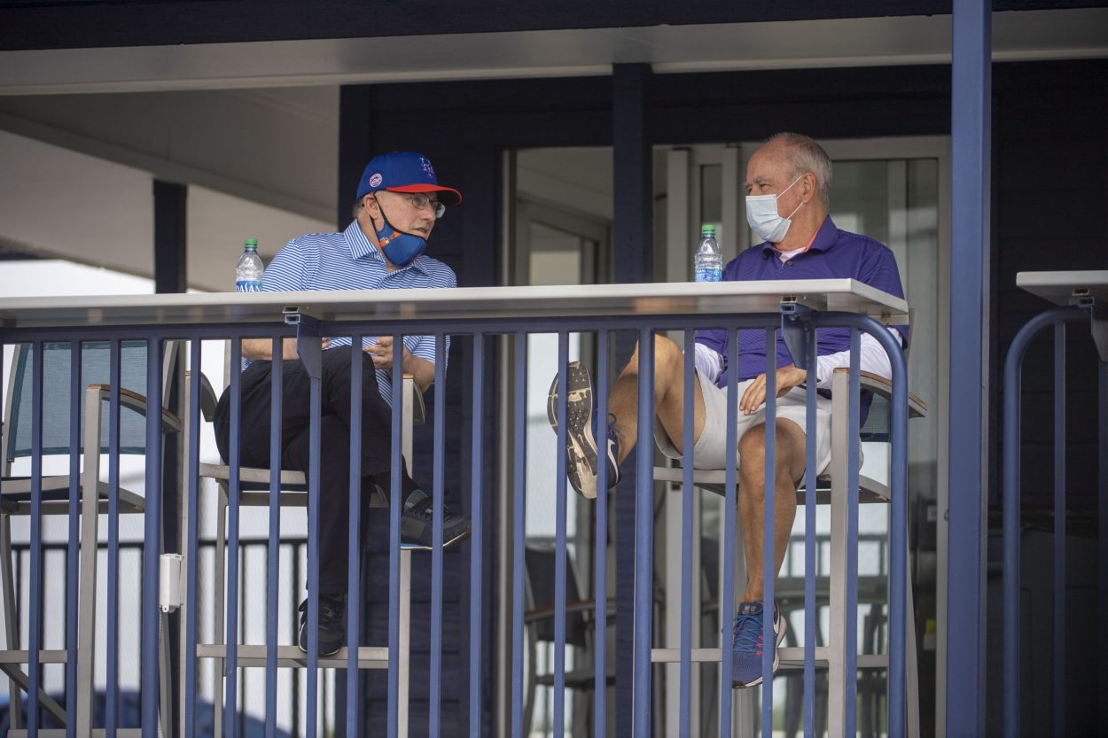 Mets owner Steve Cohen watches a Spring Training game with Sandy Alderson