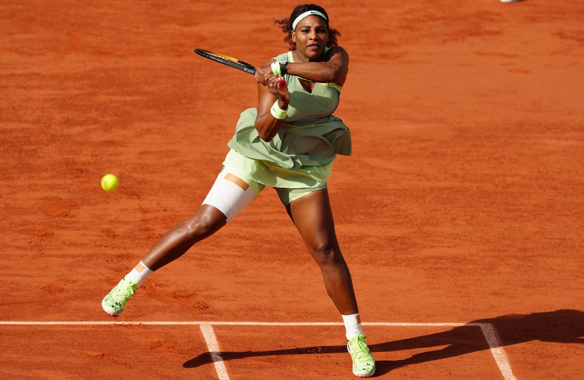 Serena Williams returns the ball during a women's singles fourth-round match against Elena Rybakina at the 2021 French Open