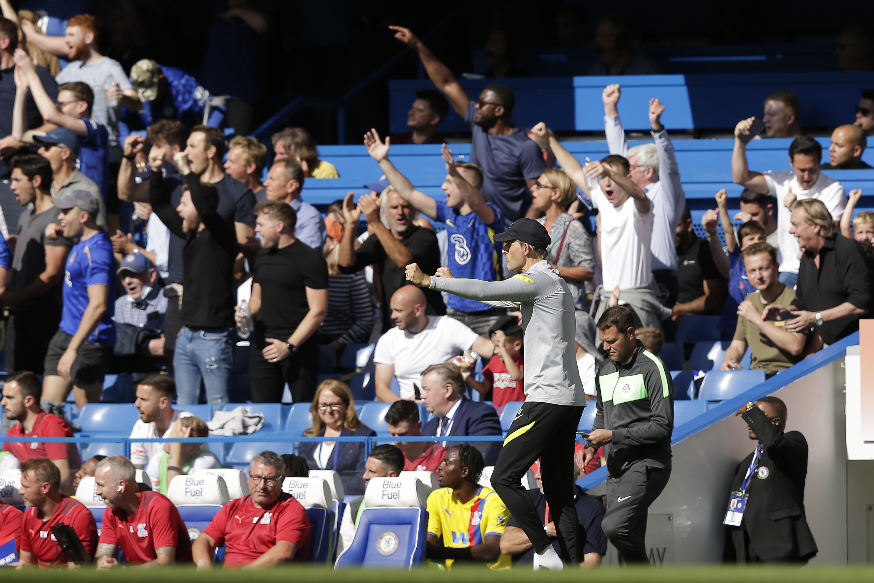 Thomas Tuchel celebrates with fans at Stamford Bridge during Chelsea FC's win over Crystal Palace