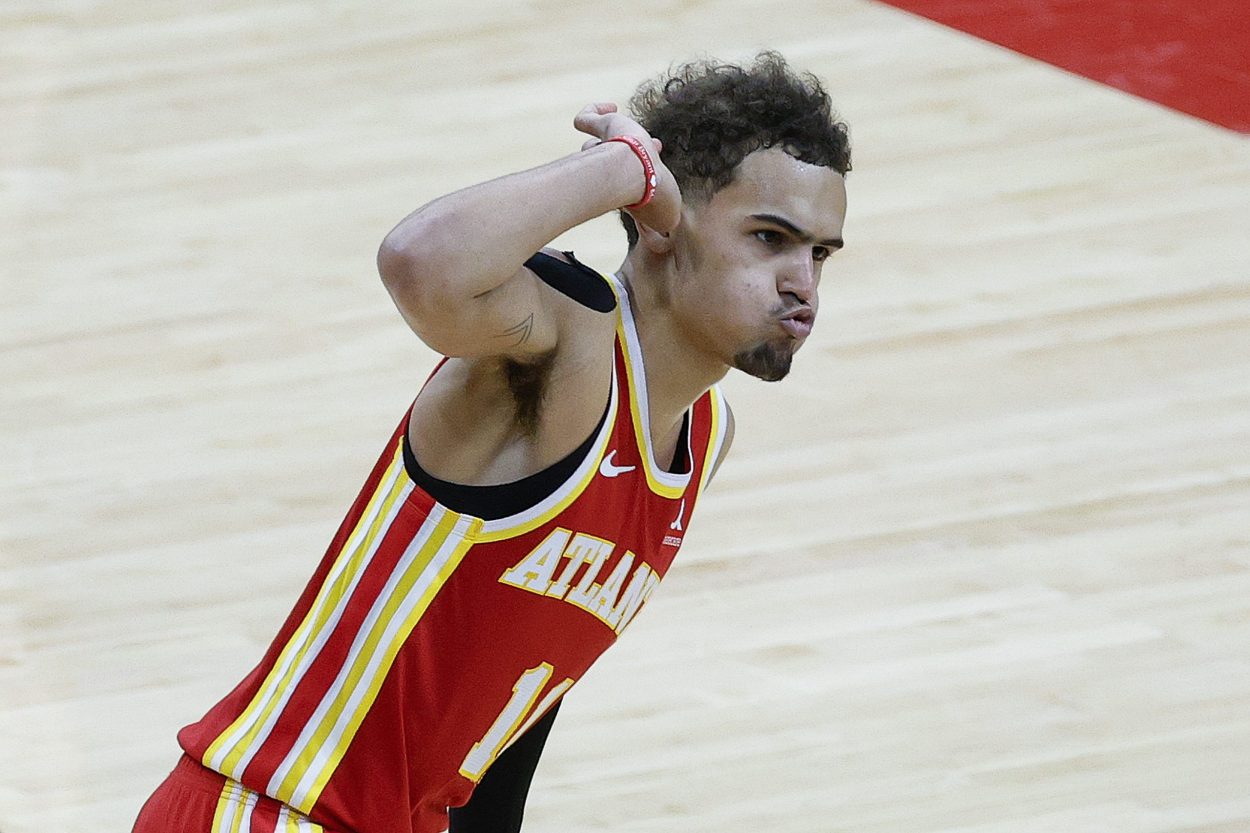 Hawks star Trae Young celebrates during a playoff game against the Philadelphia 76ers