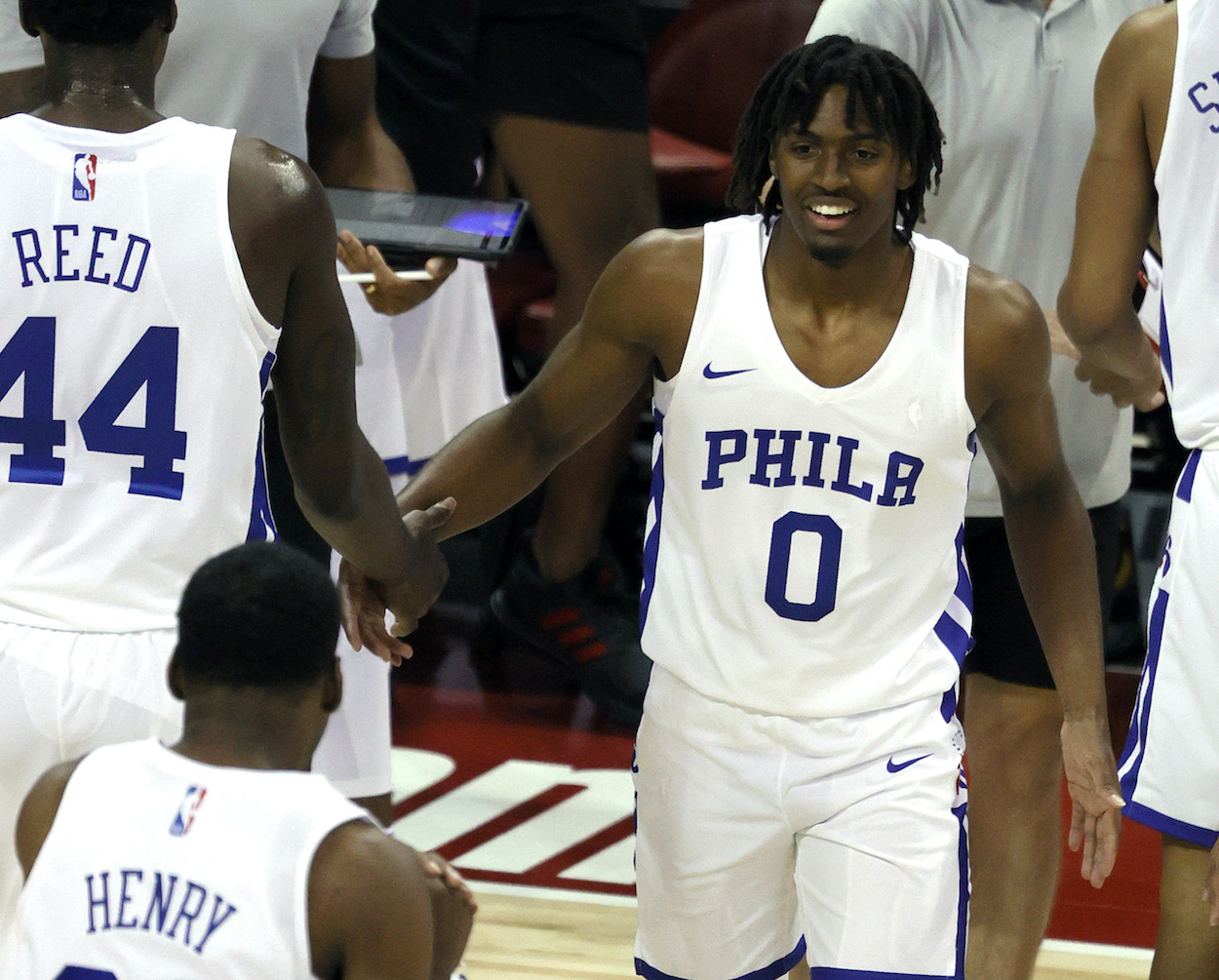 Tyrese Maxey of the Philadelphia 76ers greets teammates on the court during a timeout in their game against the Dallas Mavericks during the 2021 NBA Summer League at the Thomas & Mack Center on August 9, 2021 in Las Vegas, Nevada. The Sixers defeated the Mavericks 95-73.