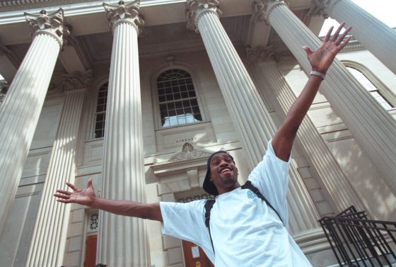Vince Carter poses in front of the University of North Carolina library.