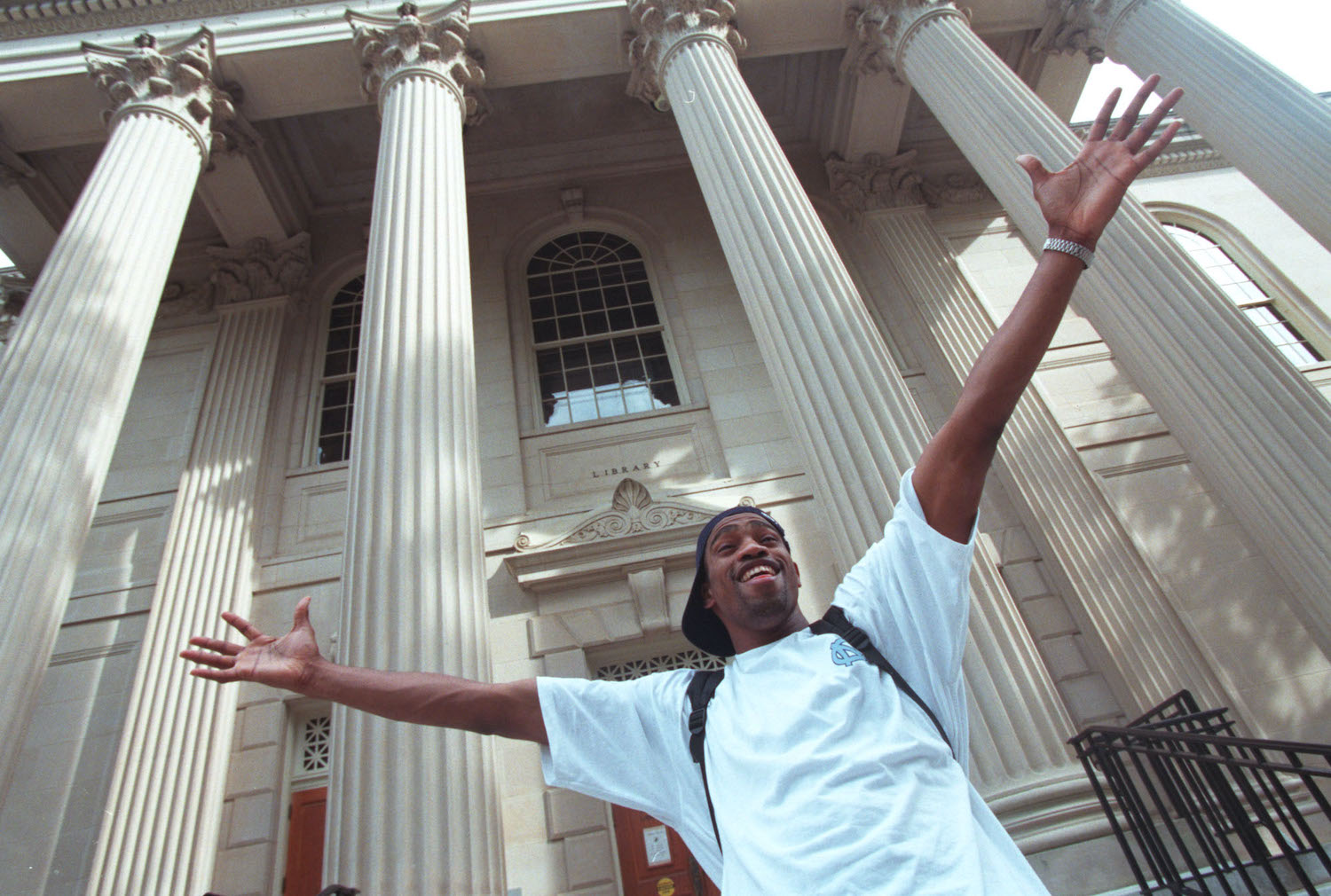 Vince Carter poses in front of the University of North Carolina library.