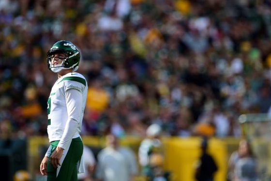 New York Jets rookie quarterback Zach Wilson looks up at the scoreboard during a preseason game.