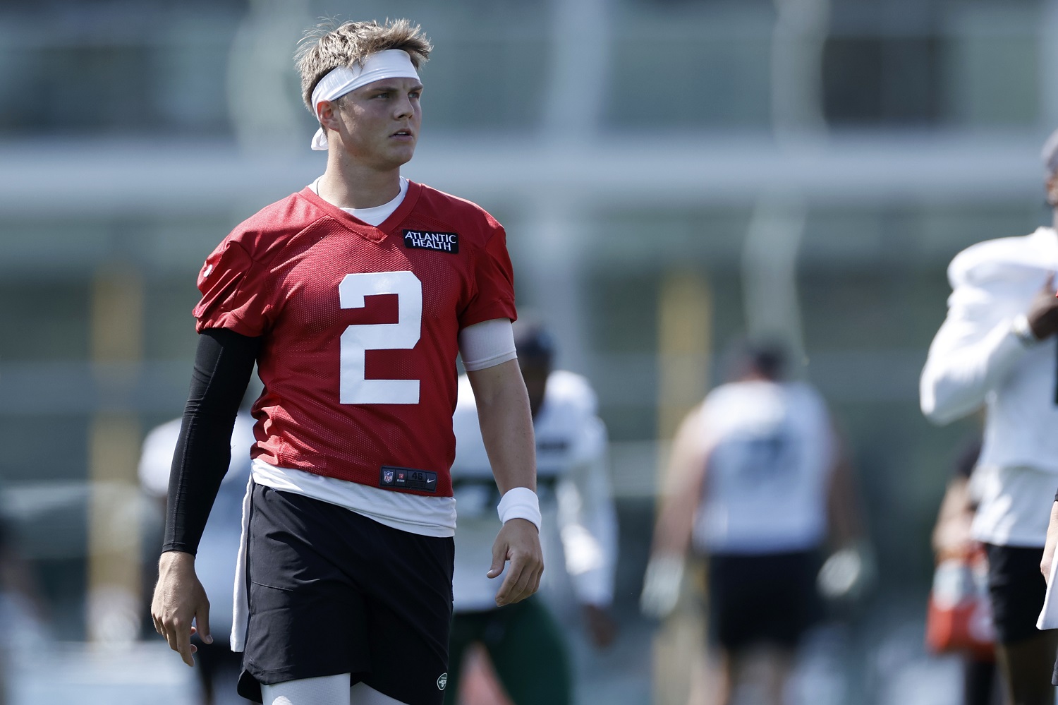 Zach Wilson of the New York Jets looks on during practice at Atlantic Health Jets Training Center on July 30, 2021.