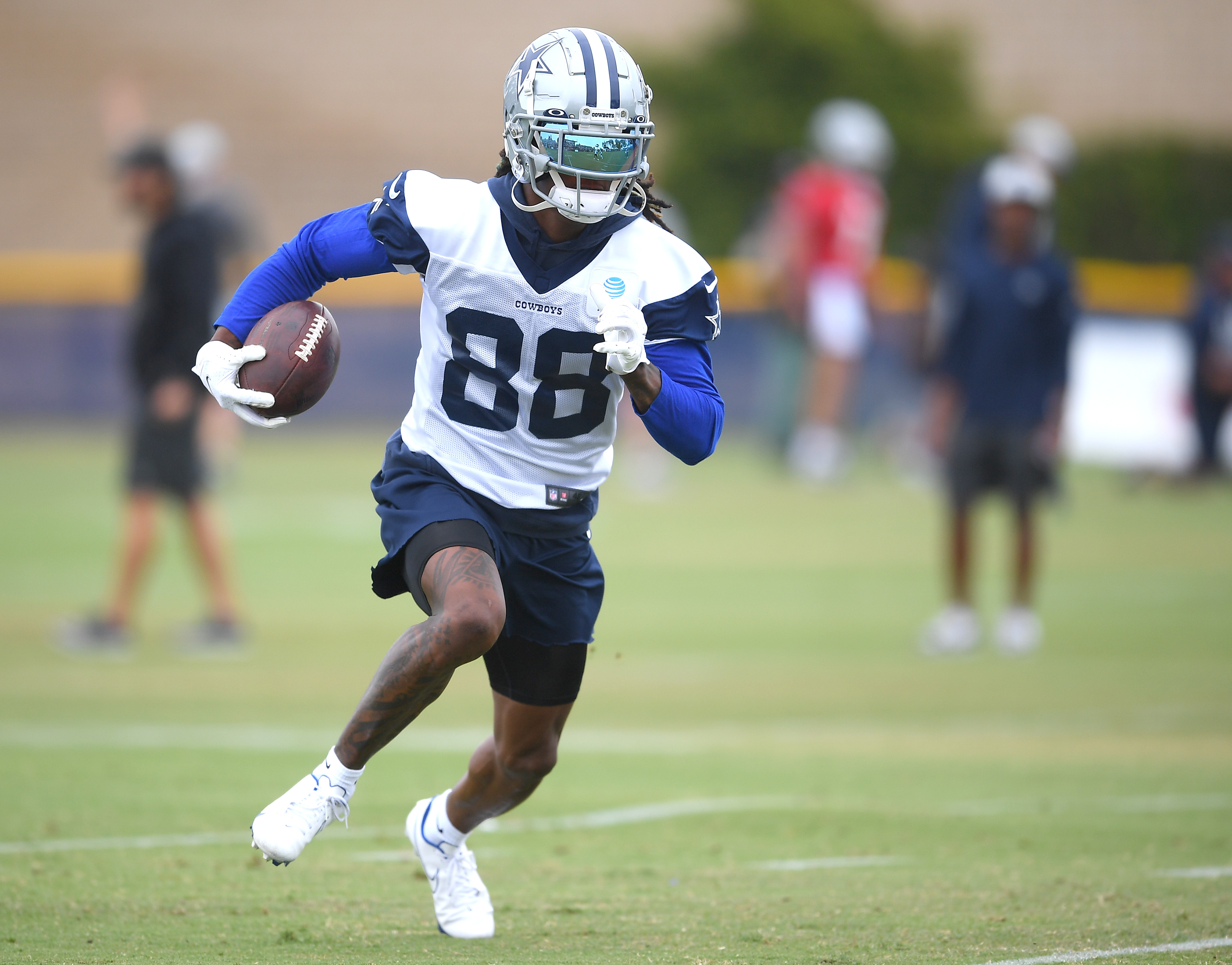CeeDee Lamb catches a pass during Dallas Cowboys training camp