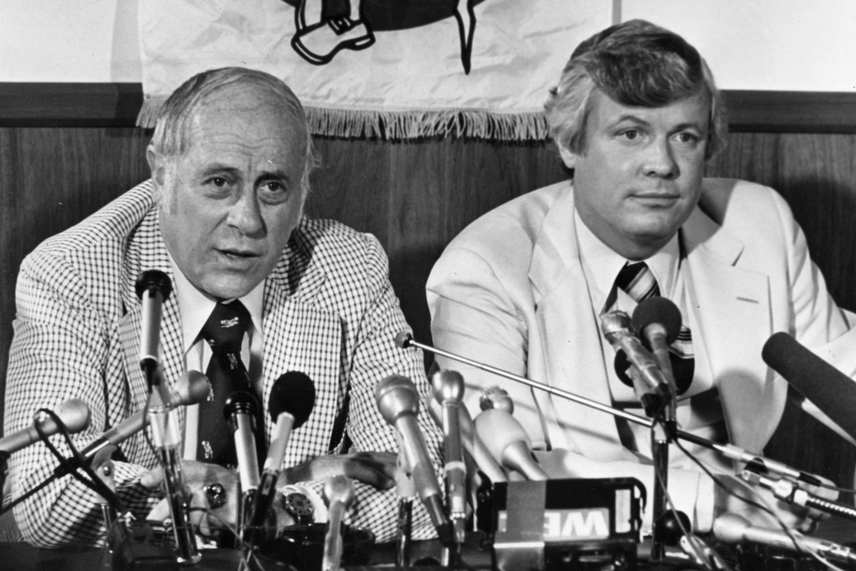 Boston Celtics general manager Red Auerbach and new Celtics owner John Y. Brown meet the press in July 1978