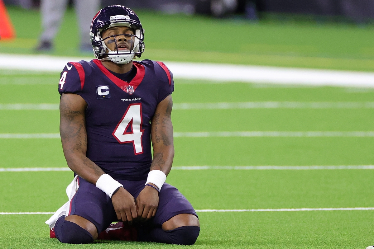 A dejected Deshaun Watson reacts to play during a game against the Tennessee Titans.