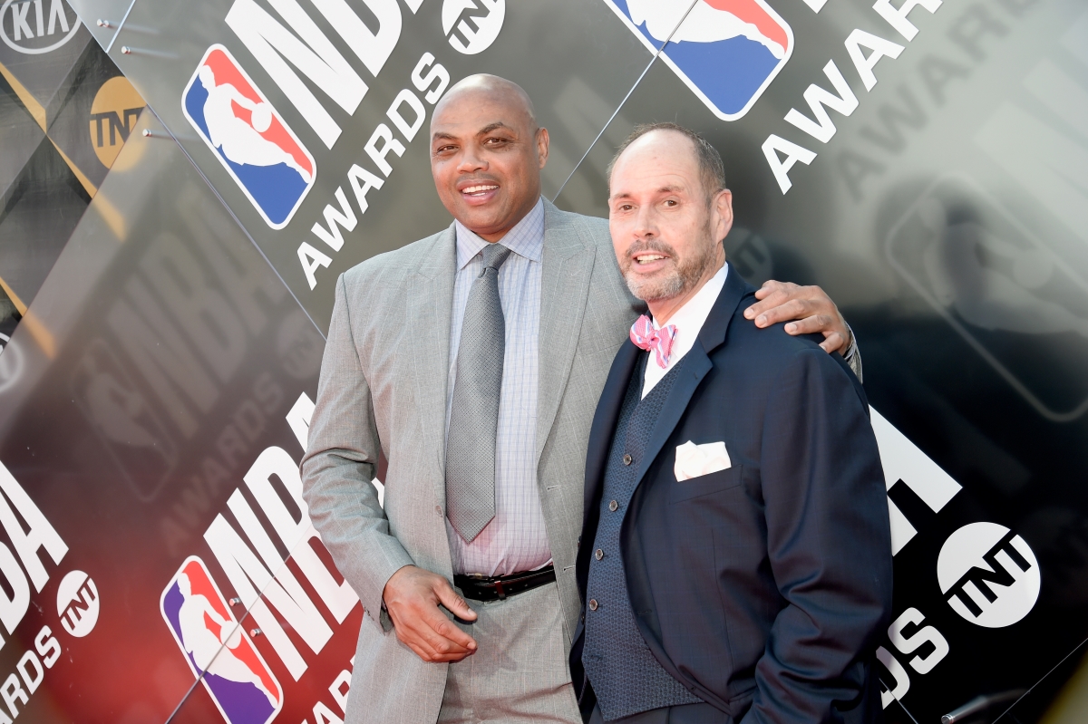 Charles Barkley and Ernie Johnson pose next to each other for a picture.