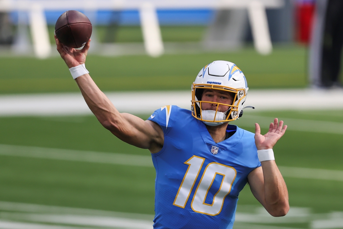 Justin Herbert of the Los Angeles Chargers warms up before playing against the Denver Broncos. Herbert will find his way into the MVP conversation by season's end.