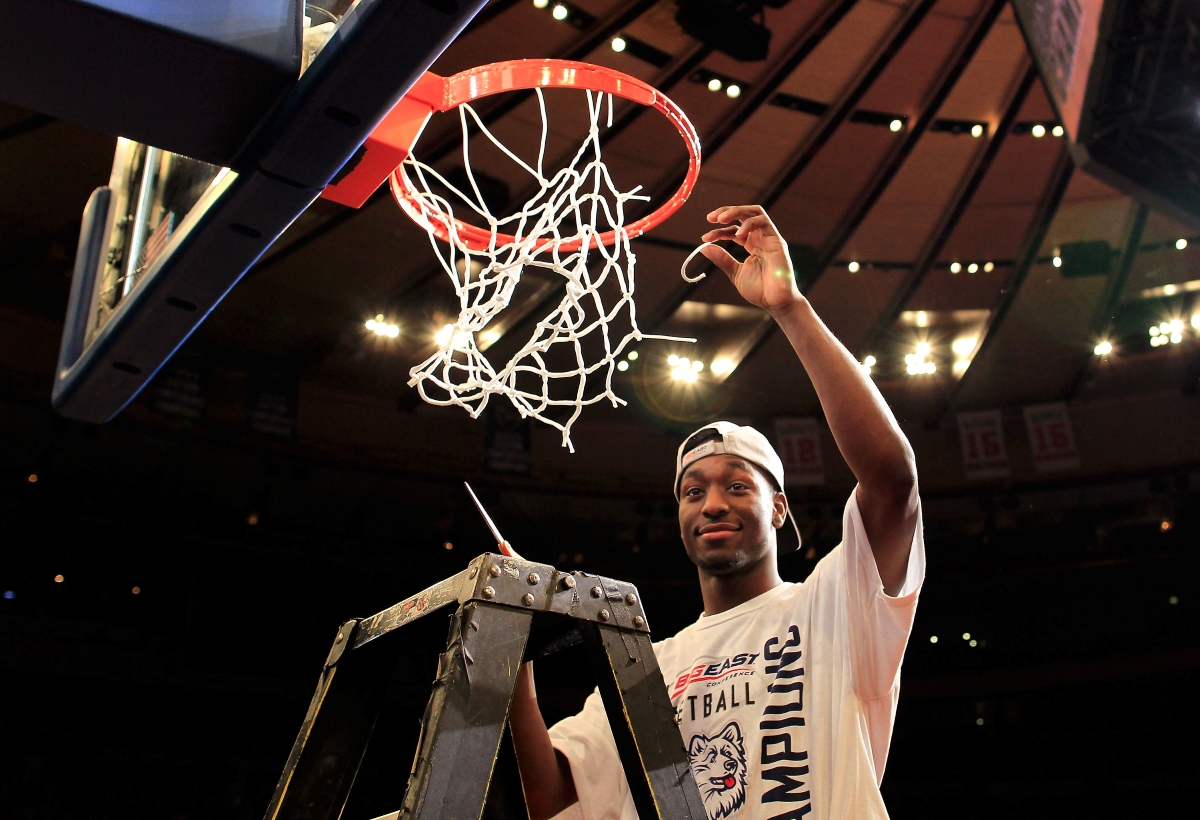 Kemba Walker cuts down the net after leading the UConn Huskies to a Big East Tournament Championship in 2011.