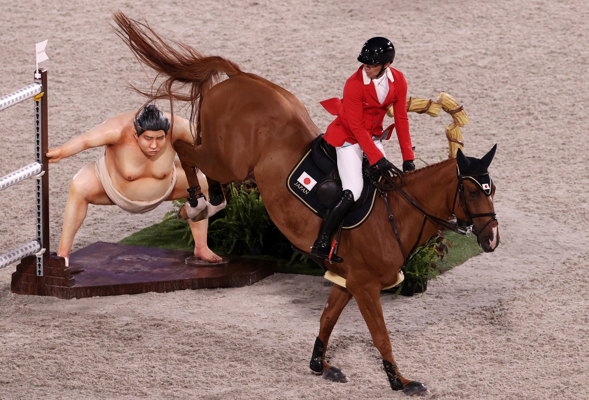 A lifesize sumo wrestler statue in the equestrian show jumping event at the Olympics is causing quite the stir.