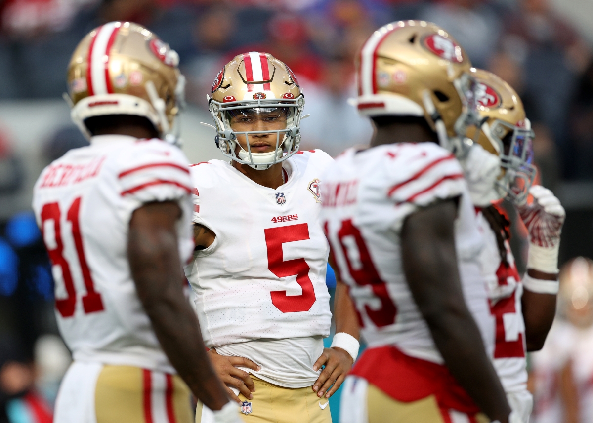 Trey Lance of the San Francisco 49ers waits to call a play after replacing Jimmy Garoppolo during the first half of a preseason game.