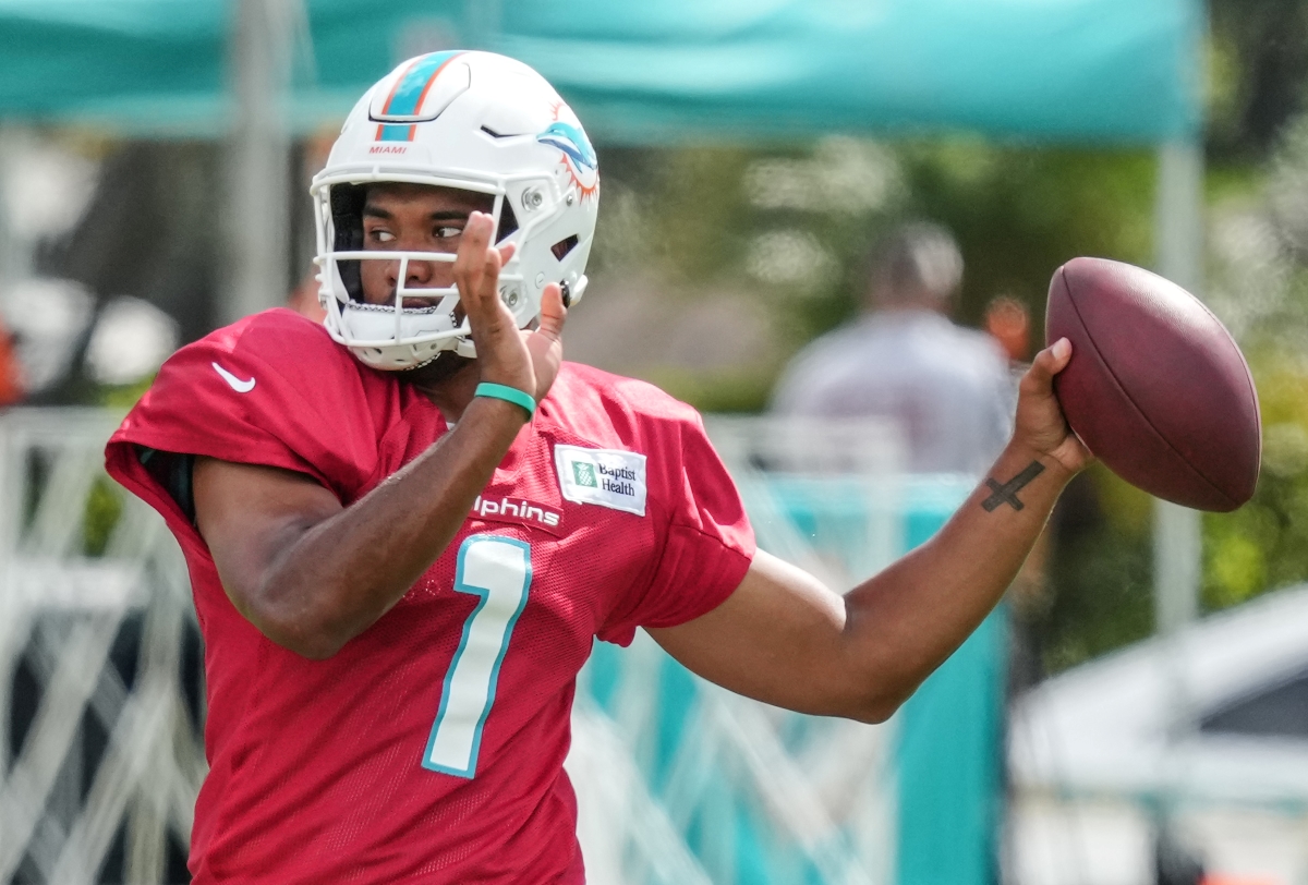 Miami Dolphins' quarterback Tua Tagovailoa throws a pass during training camp.