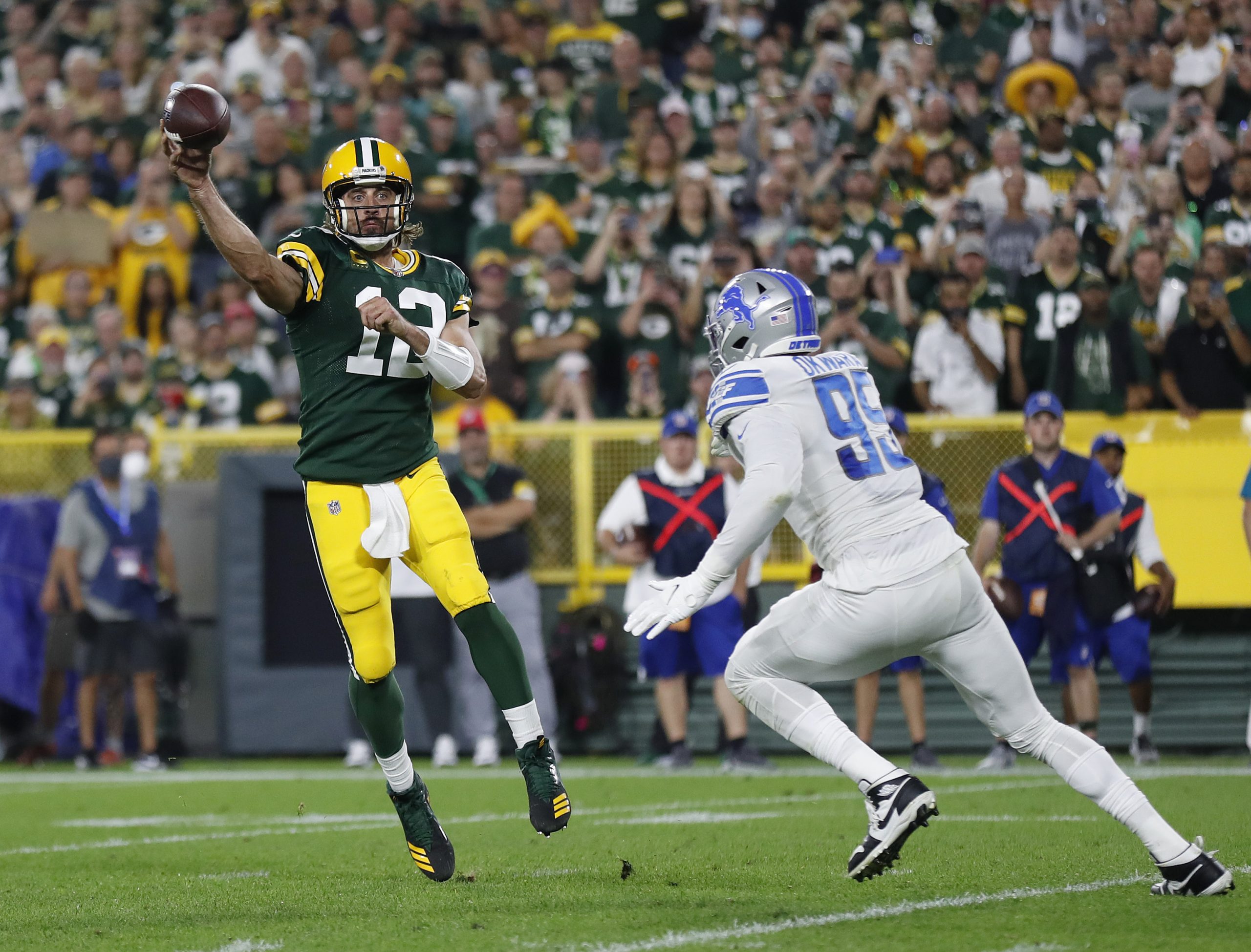 Aaron Rodgers of the Green Bay Packers throws under pressure.