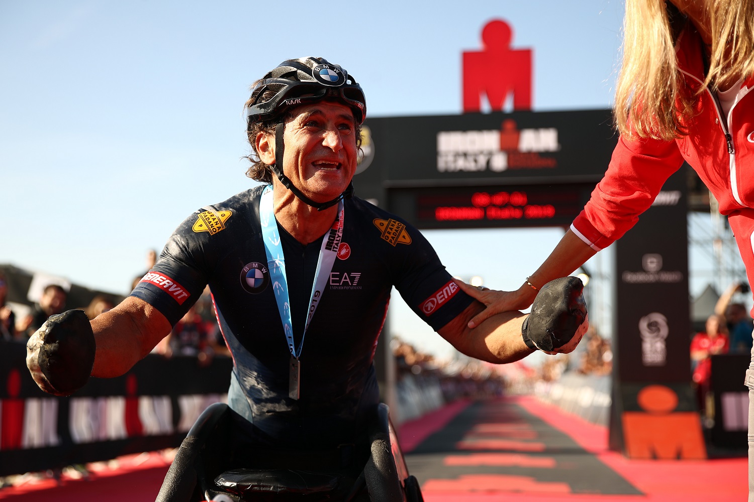Alex Zanardi of Italy celebrates finishing Ironman Italy on Sept. 21, 2019, in Cervia, Italy.