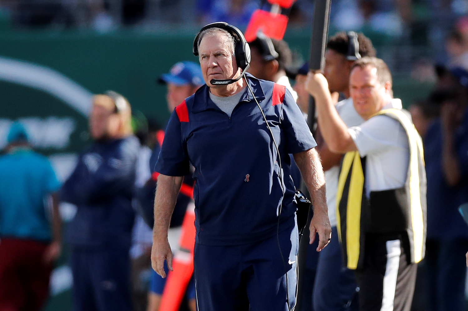 New England Patriots head coach Bill Belichick watches his team play against the New York Jets.