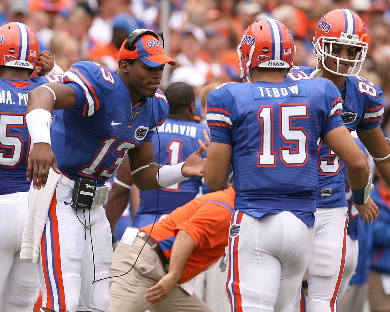 Cam Newton celebrating with Florida Gators teammate Tim Tebow