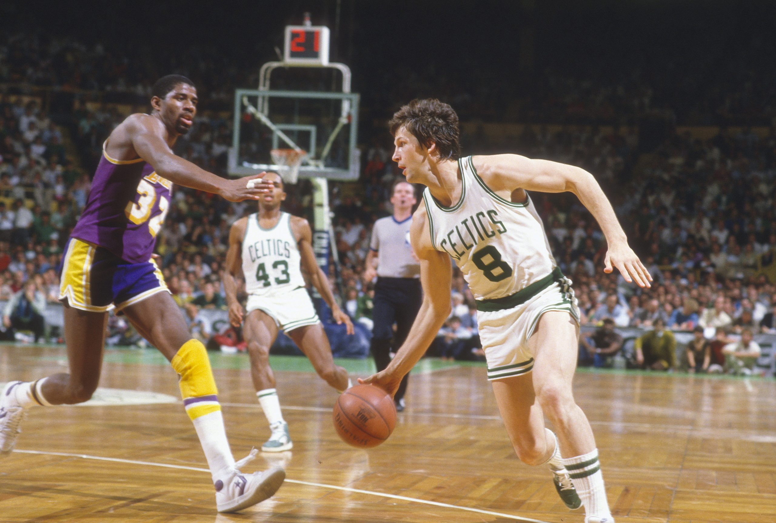 Scott Wedman of the Boston Celtics dribbles the ball against the Los Angeles Lakers.