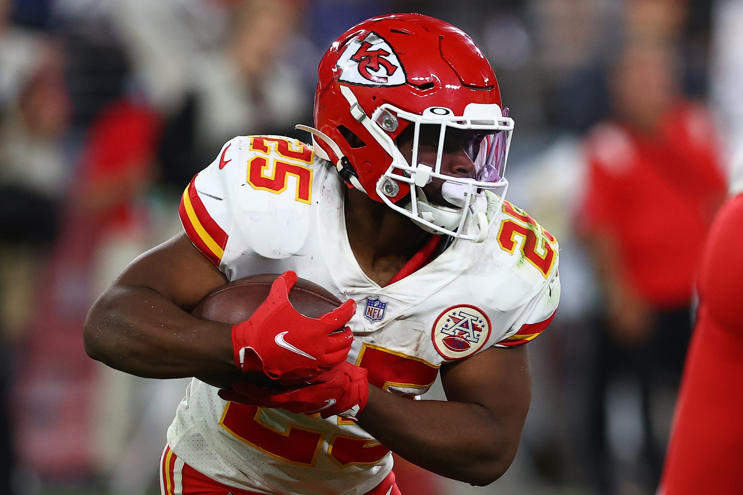 Clyde Edwards-Helaire of the Kansas City Chiefs runs with the ball against the Baltimore Ravens.