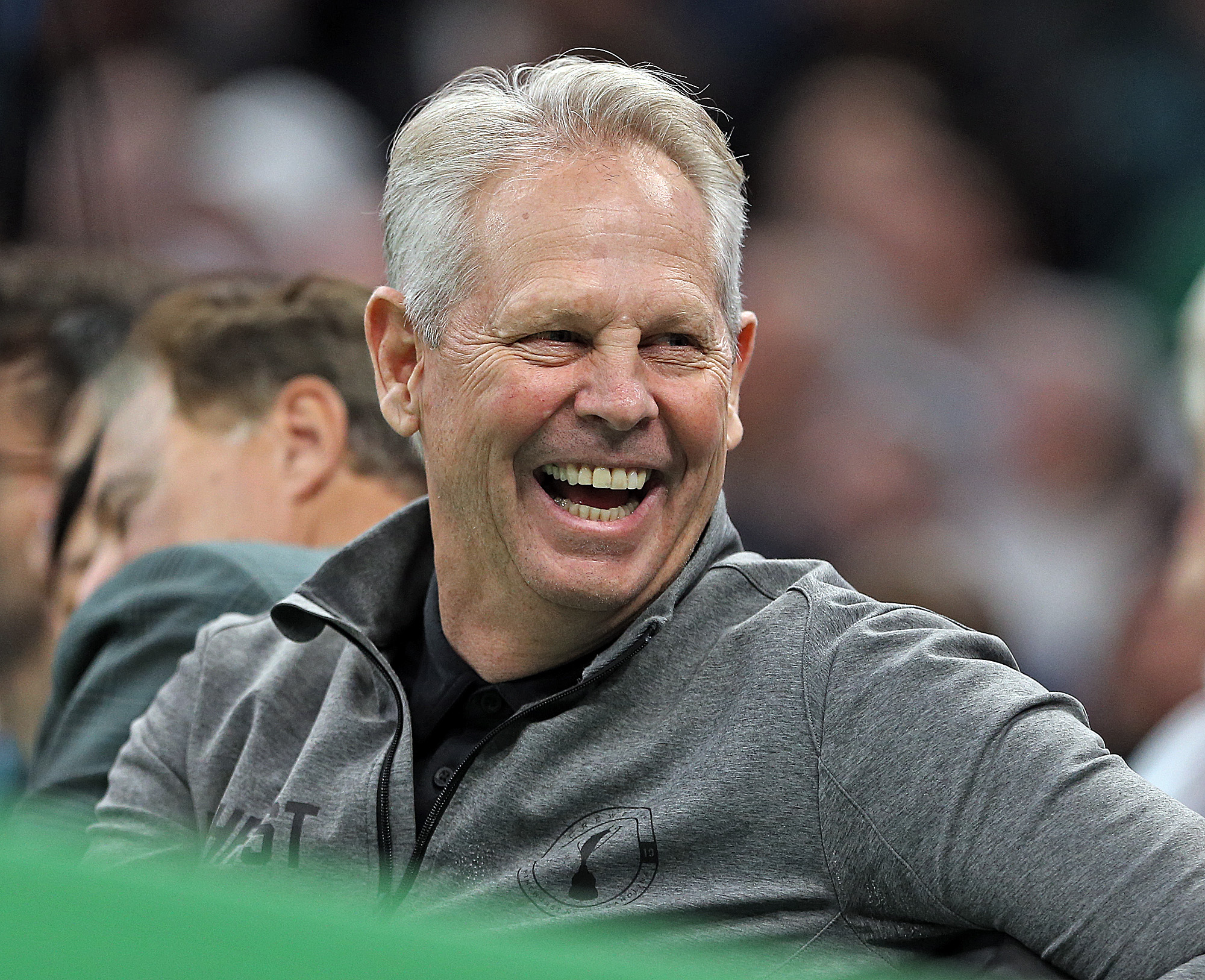 Danny Ainge, former GM of the Boston Celtics has a laugh during the first quarter of the NBA game against the LA Clippers.