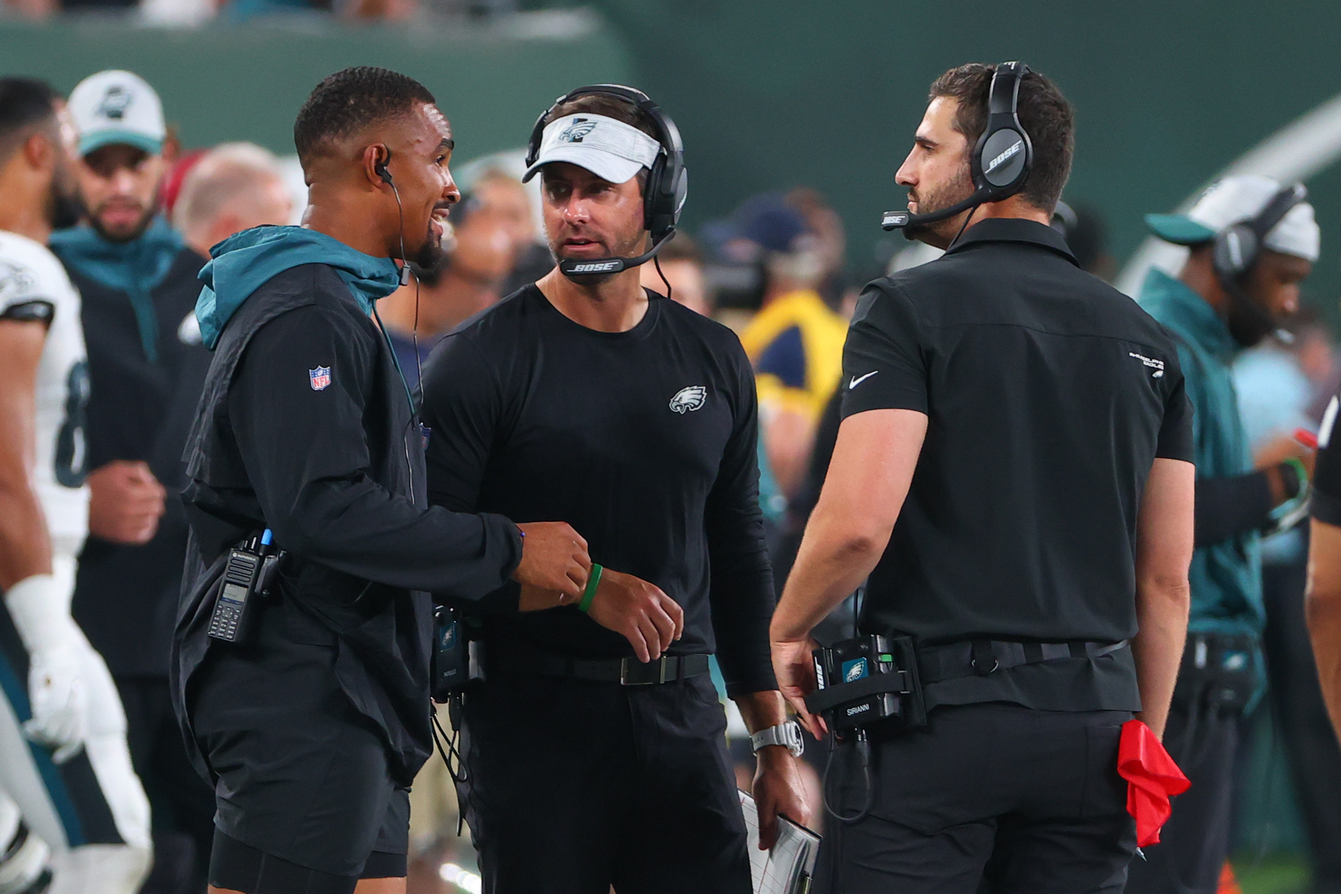 Eagles head coach Nick Sirianni talks with Jalen Hurts during preseason game