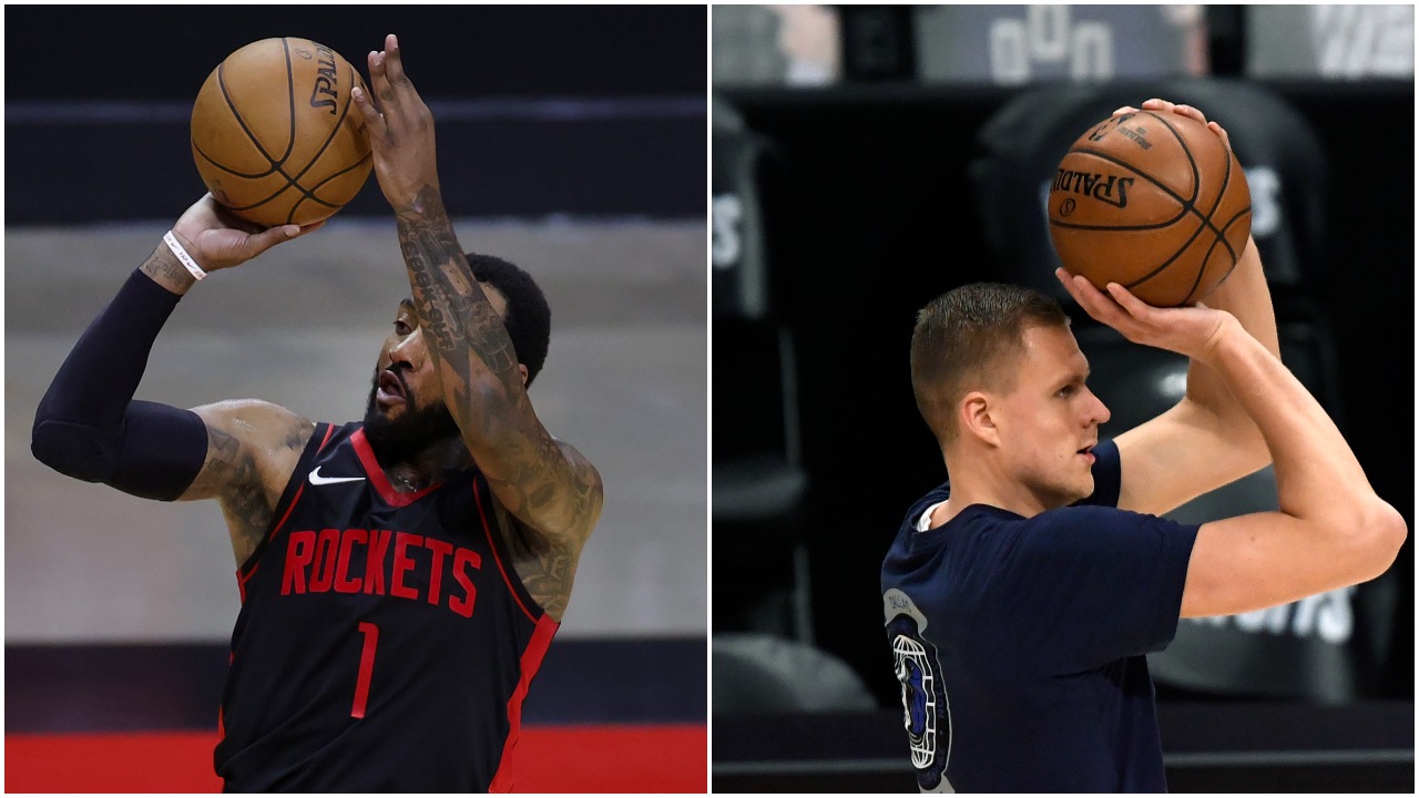 Rockets guard John Wall and Mavericks big man Kristaps Porzingis shoot the ball.
