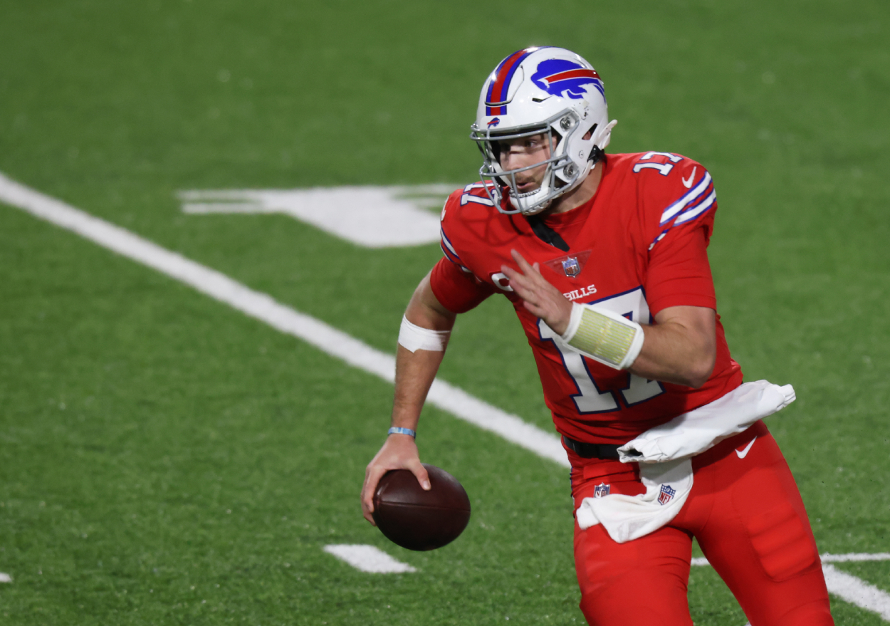 Josh Allen of the Buffalo Bills runs the ball against the Pittsburgh Steelers.