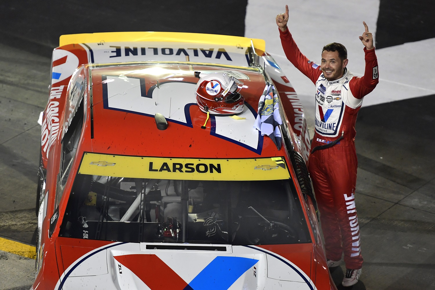 Kyle Larson, driver of the No. 5 Chevrolet, celebrates after winning the NASCAR Cup Series Bass Pro Shops Night Race at Bristol Motor Speedway on Sept. 18, 2021. | Logan Riely/Getty Images)