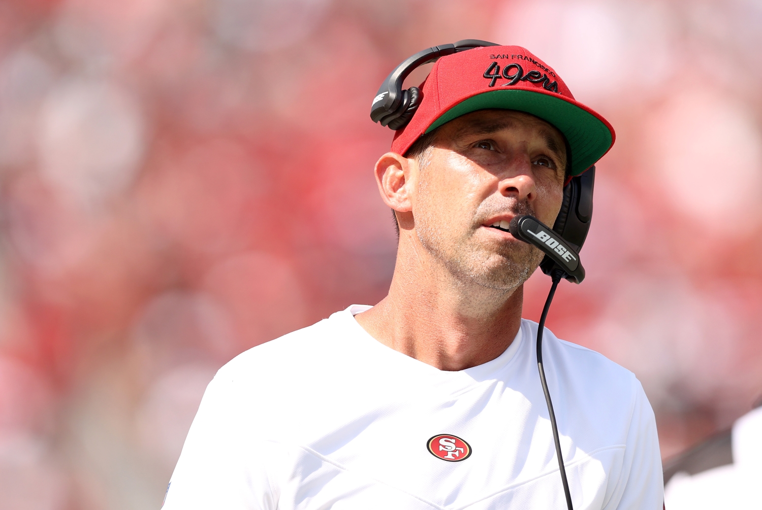 San Francisco 49ers head coach Kyle Shanahan looks up during a preseason game against the Las Vegas Raiders.