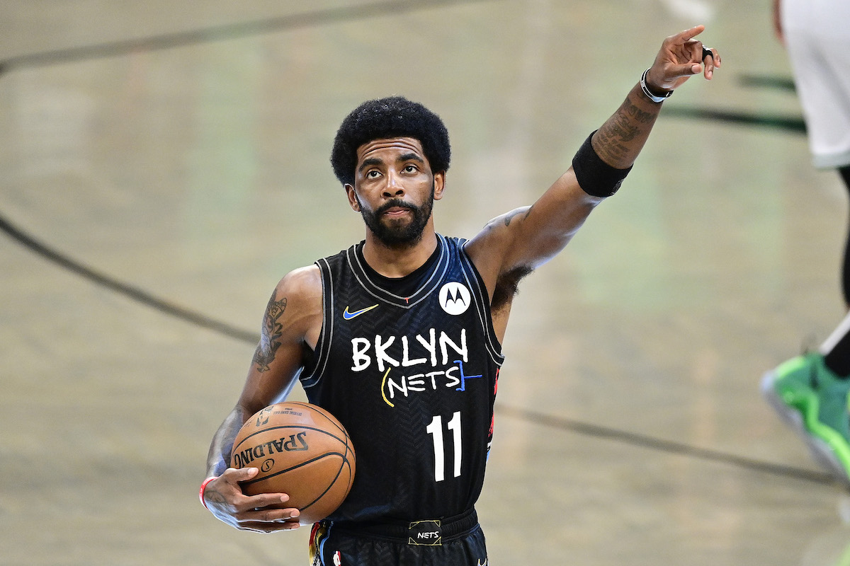 Kyrie Irving of the Brooklyn Nets acknowledges the fans before a game