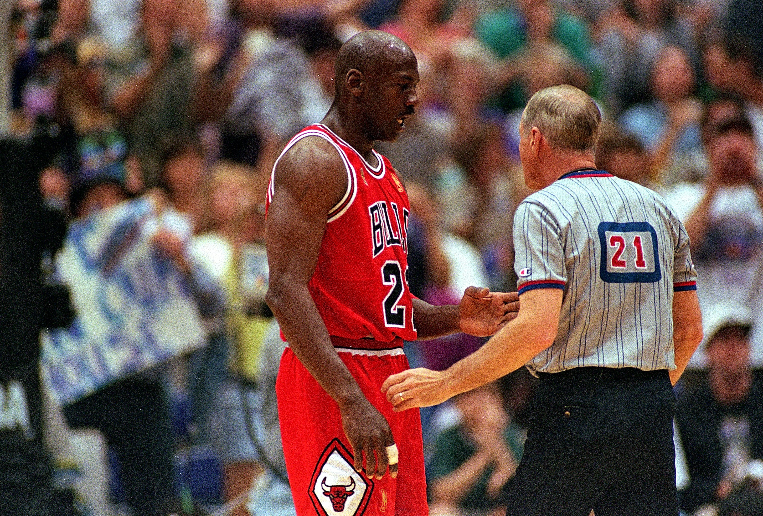 Michael Jordan talks to a referee during the 1997 NBA Finals