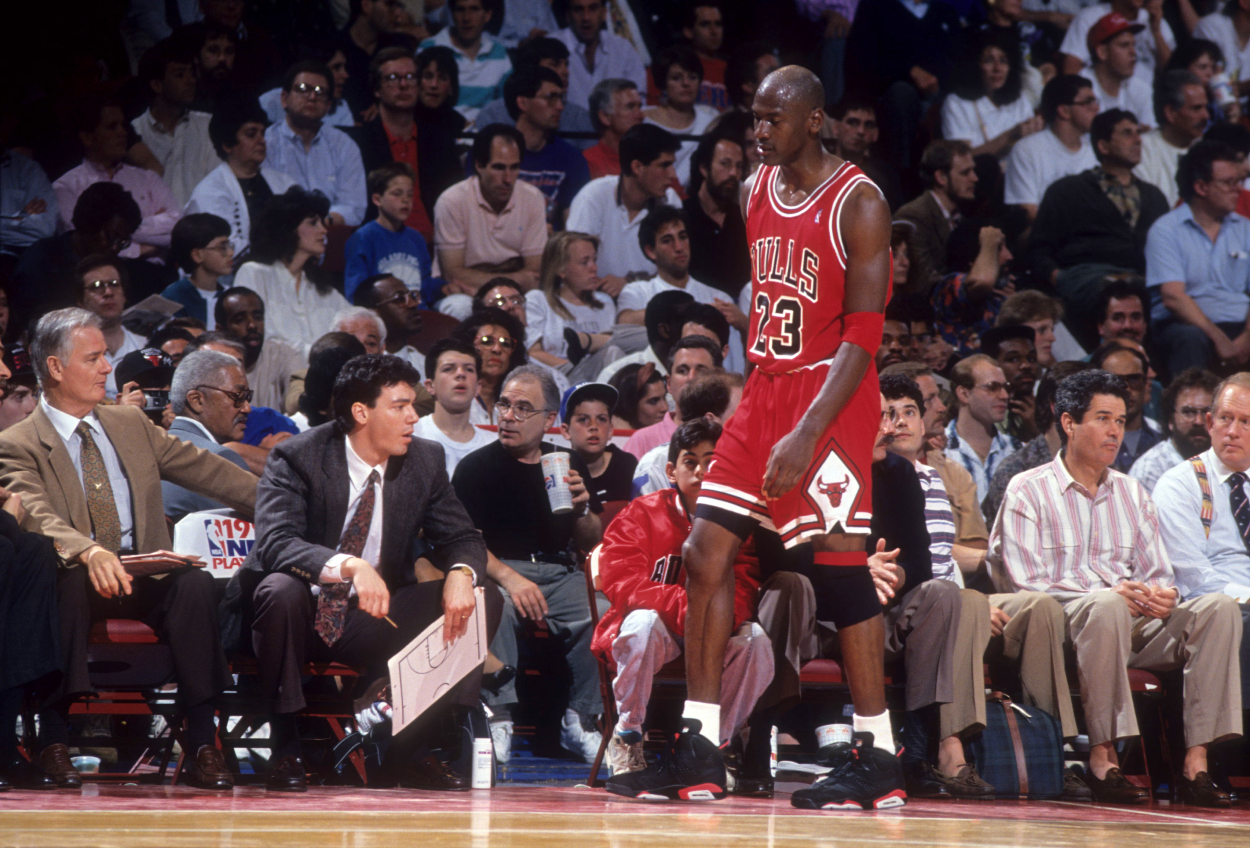 Michael Jordan of the Chicago Bulls walks to the bench during a game in the 1991 Eastern Conference Semifinals against the Philadelphia 76ers.