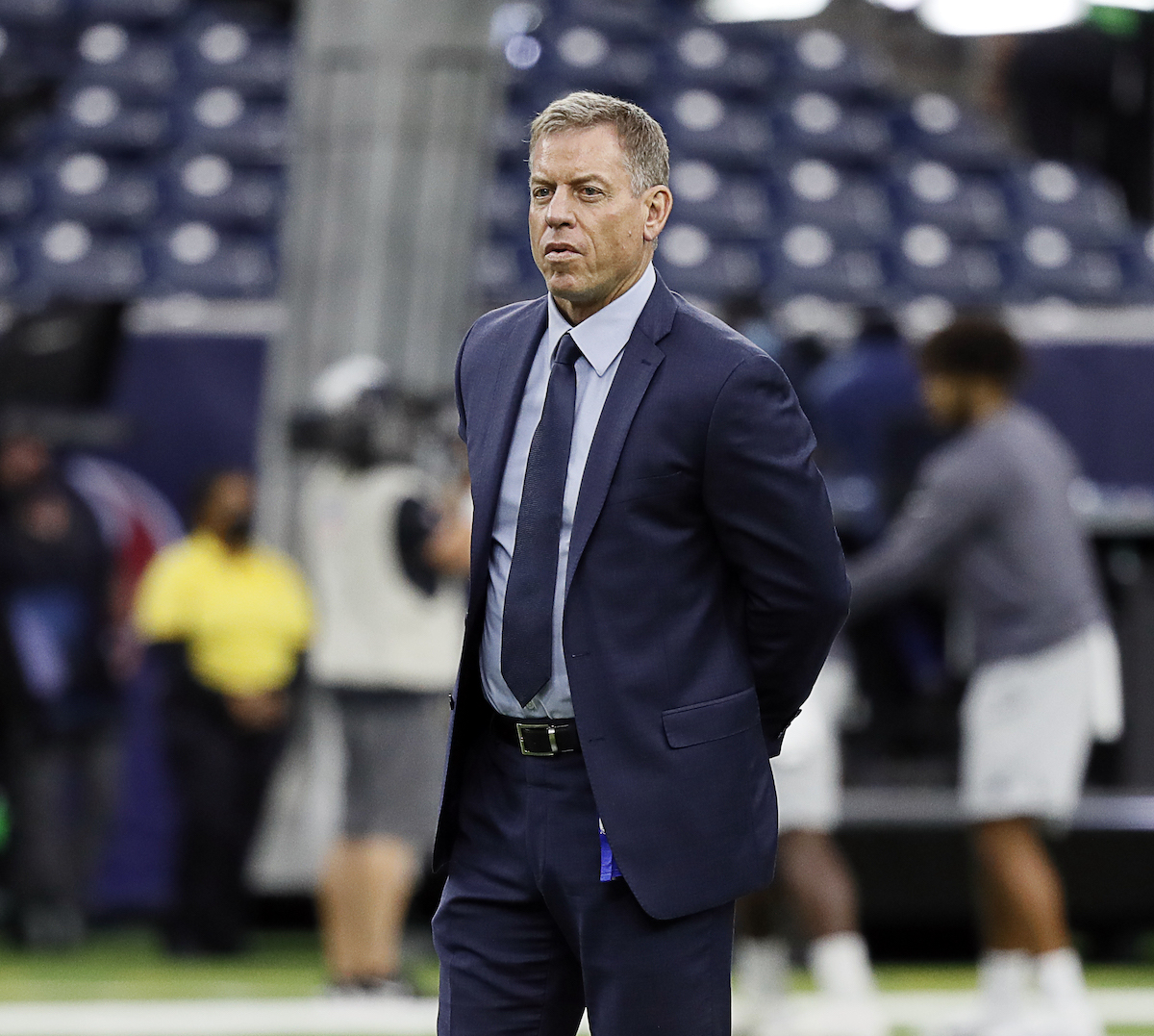 NFL on FOX personality Troy Aikman watches warmups prior to a game between the Carolina Panthers and the Houston Texans