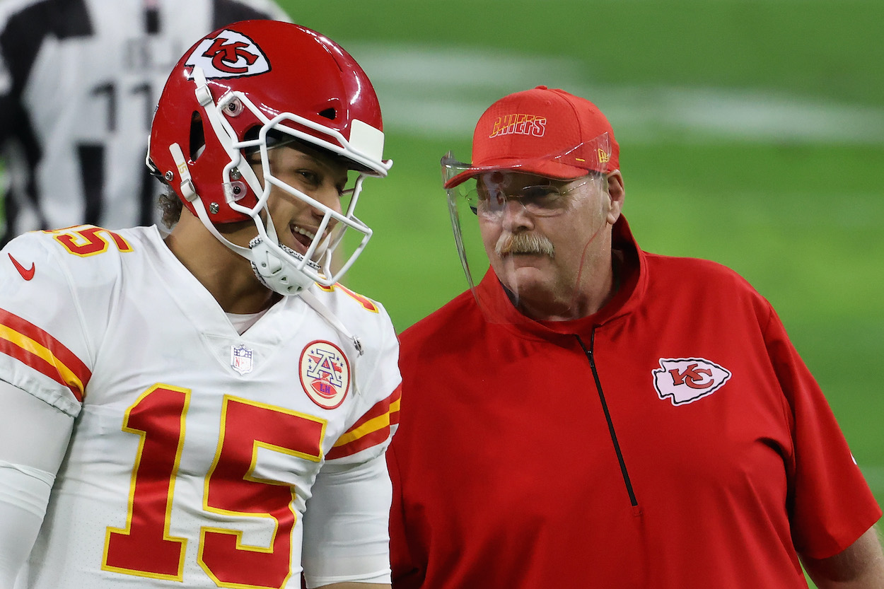 Quarterback Patrick Mahomes of the Kansas City Chiefs talks with head coach Andy Reid before the NFL game against the Las Vegas Raiders at Allegiant Stadium on November 22, 2020 in Las Vegas, Nevada. The Chiefs defeated the Raiders 35-31.