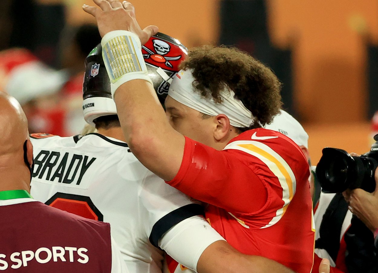 Kansas City Chiefs quarterback Patrick Mahomes (R) remains among the highest-paid NFL players after signing his massive extension in 2020.