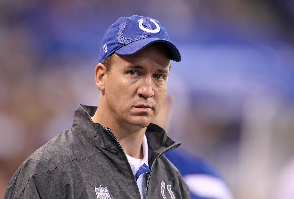 Peyton Manning of the Indianapolis Colts watches the game action in the Colts 17-3 loss to the Jacksonville Jaguars at Lucas Oil Stadium on November 13, 2011 in Indianapolis, Indiana.