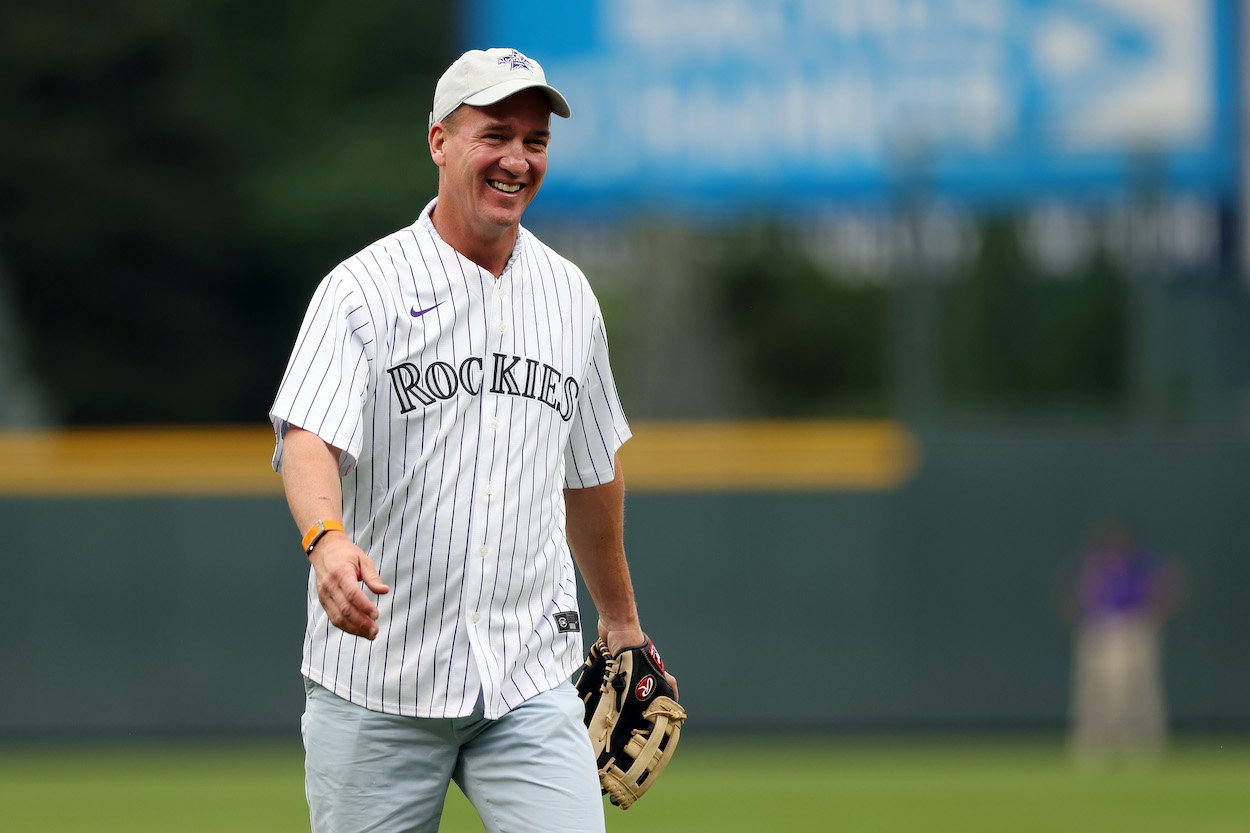 Peyton Manning smiles after throwing out the ceremonial first pitch ahead of the 91st MLB All-Star Game at Coors Field on July 13, 2021 in Denver, Colorado.