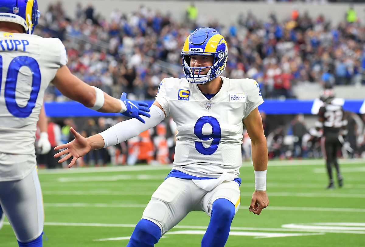 Rams quarterback Matthew Stafford celebrates his touchdown pass to Cooper Kupp