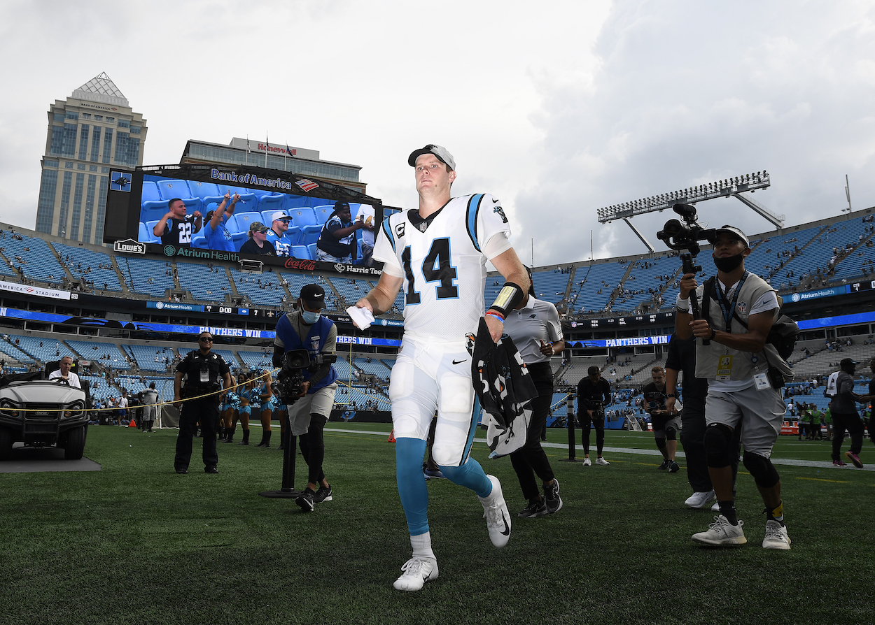 Panthers quarterback Sam Darnold runs off the field after a Week 2 victory