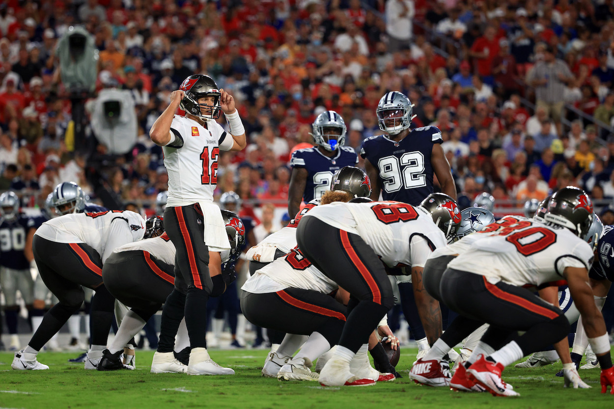 Tom Brady of the Tampa Bay Buccaneers prepares for a play during the first quarter against the Dallas Cowboys at Raymond James Stadium to kickoff the NFL season on September 09, 2021 in Tampa, Florida.