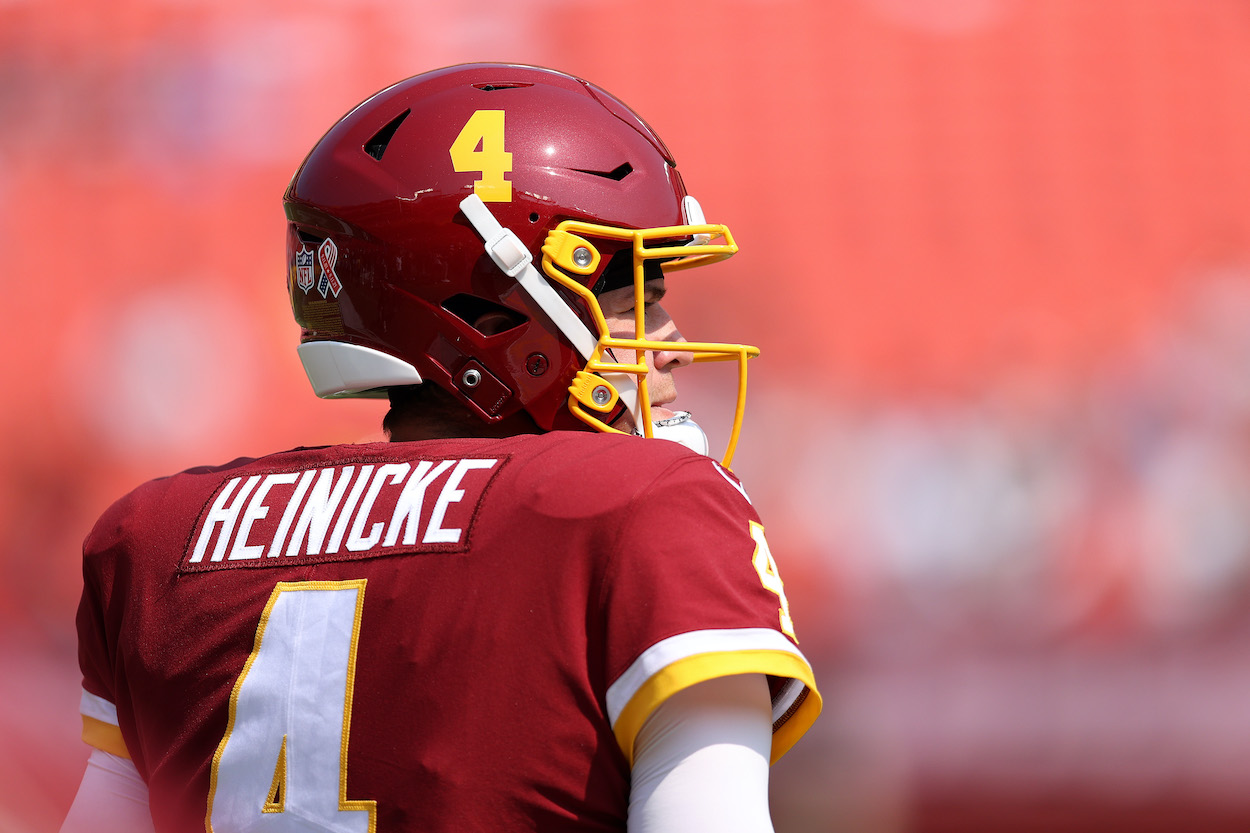 Taylor Heinicke of the Washington Football Team (and now the Bud Light family) looks on prior to the game against the Los Angeles Chargers at FedExField on September 12, 2021 in Landover, Maryland.