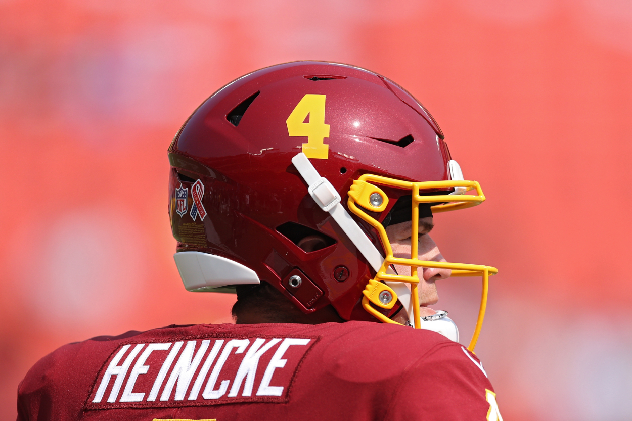 Taylor Heinicke of the Washington Football Team looks on before playing against the Los Angeles Chargers.