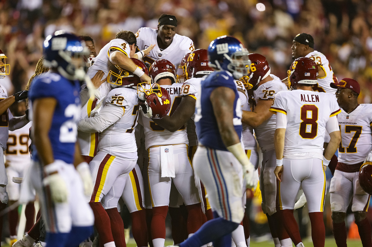 The Washington Football Team celebrates a 30-29 win over the New York Giants at FedExField on September 16, 2021 in Landover, Maryland.