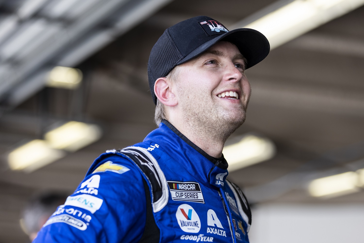 William Byron, driver of the No. 24 Chevy, looks on from the garage during the NASCAR Cup Series test at Daytona International Speedway on Sept. 7, 2021.