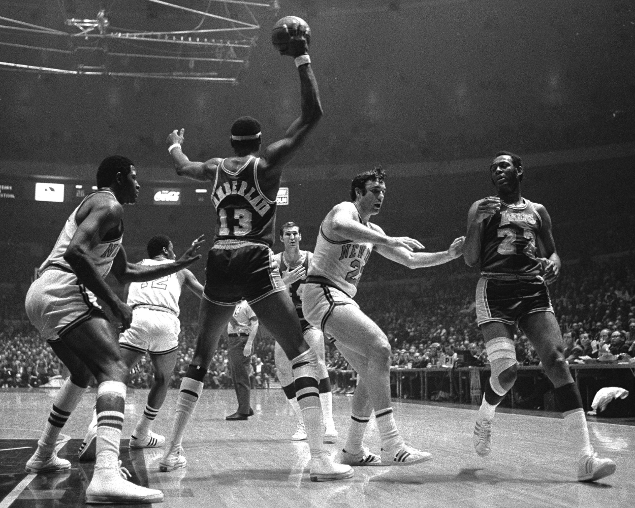 N.Y. Knicks center Willis Reed guards Los Angeles Lakers center Wilt Chamberlain.