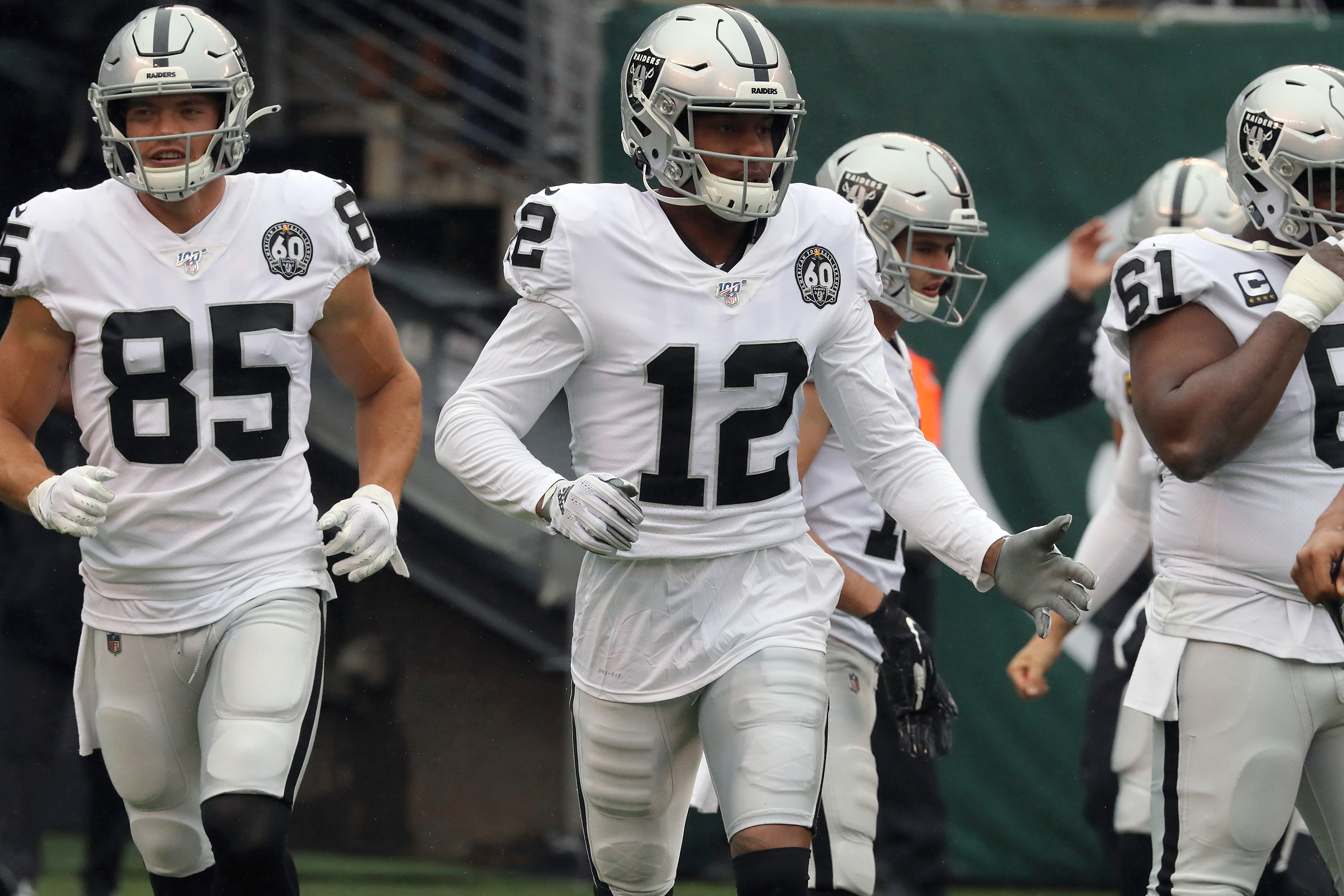 Las Vegas Raiders wide receiver Zay Jones runs out of the tunnel