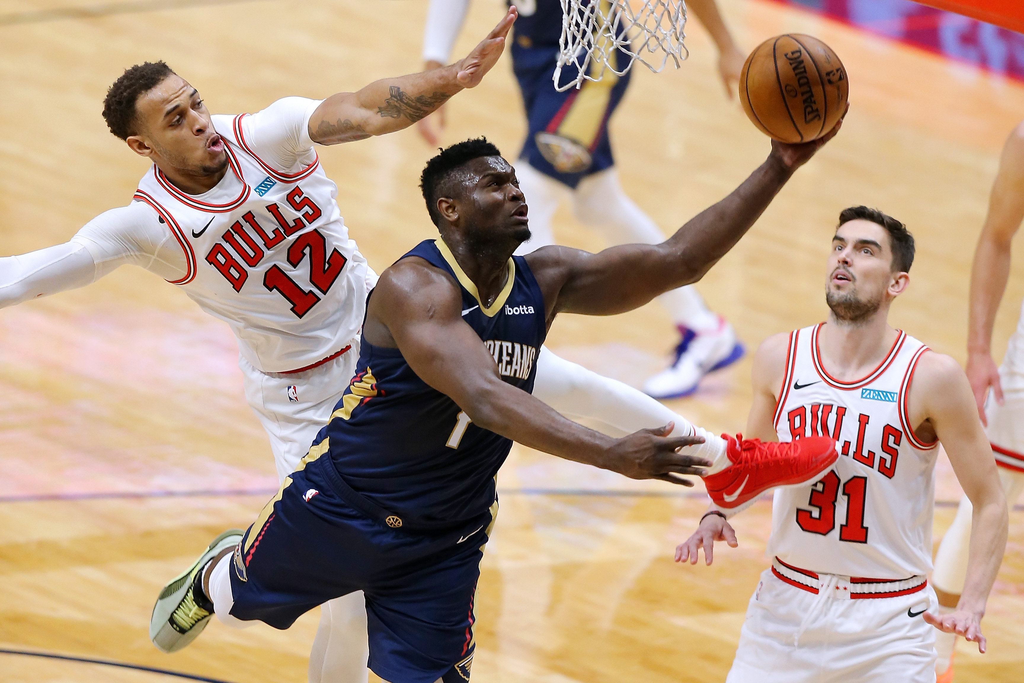 Pelicans star Zion Williamson drives to the rim during a game against the Chicago Bulls in March