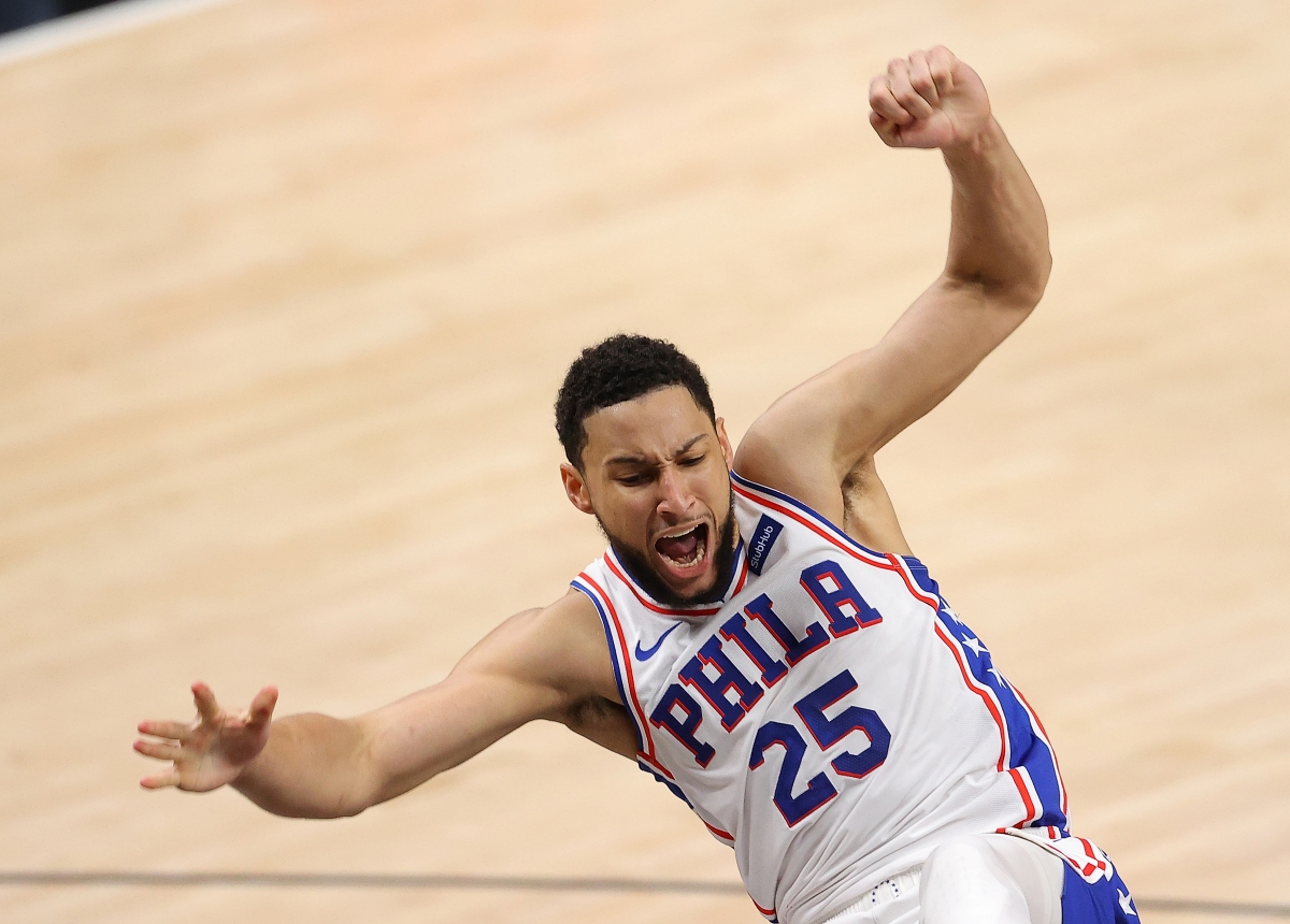 Ben Simmons falls over during a game against the Atlanta Hawks.